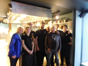 A drunk chef from Paris took this wonderful photo of us with the chef and crew. We thought it was in focus at the time :).